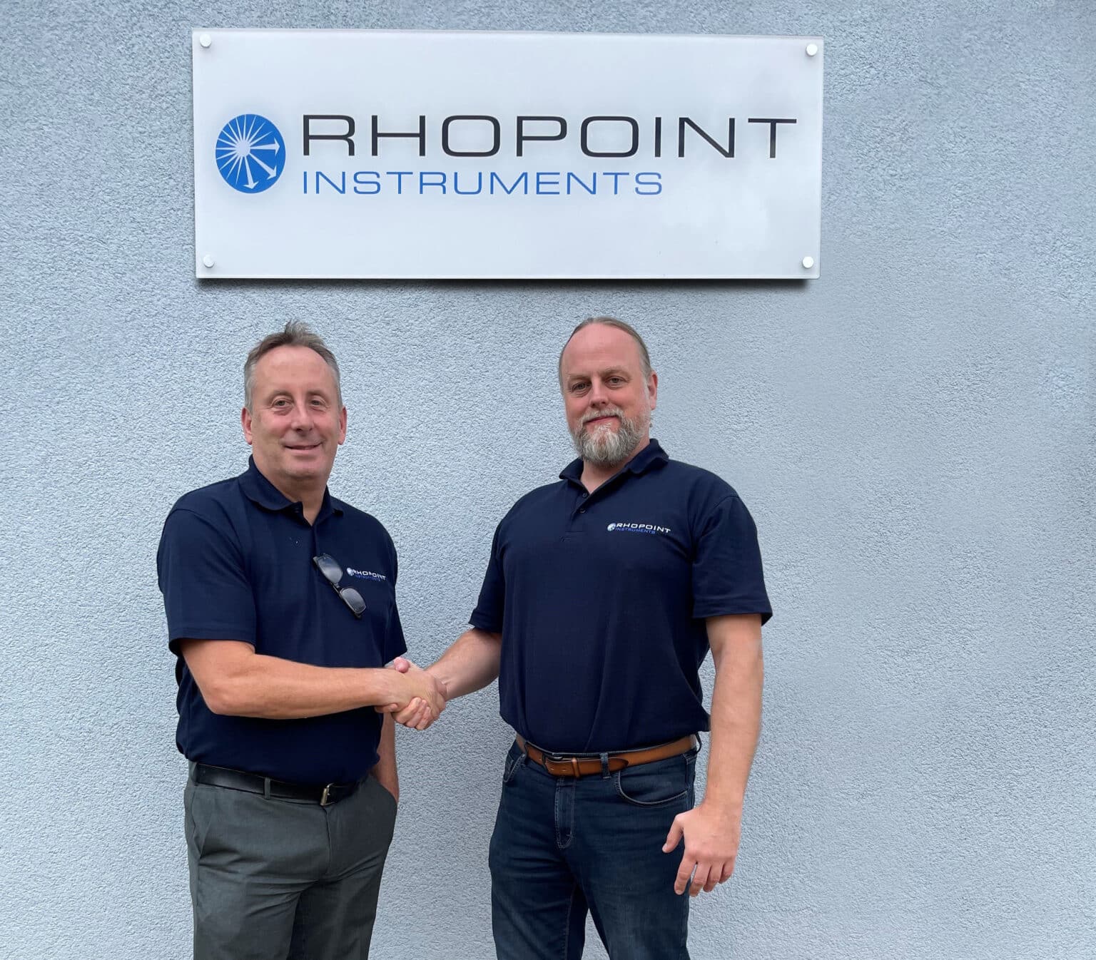 Managing Director for Rhopoint Instruments shaking hands with newly appointed Managing Director for Rhopoint Instruments GmbH